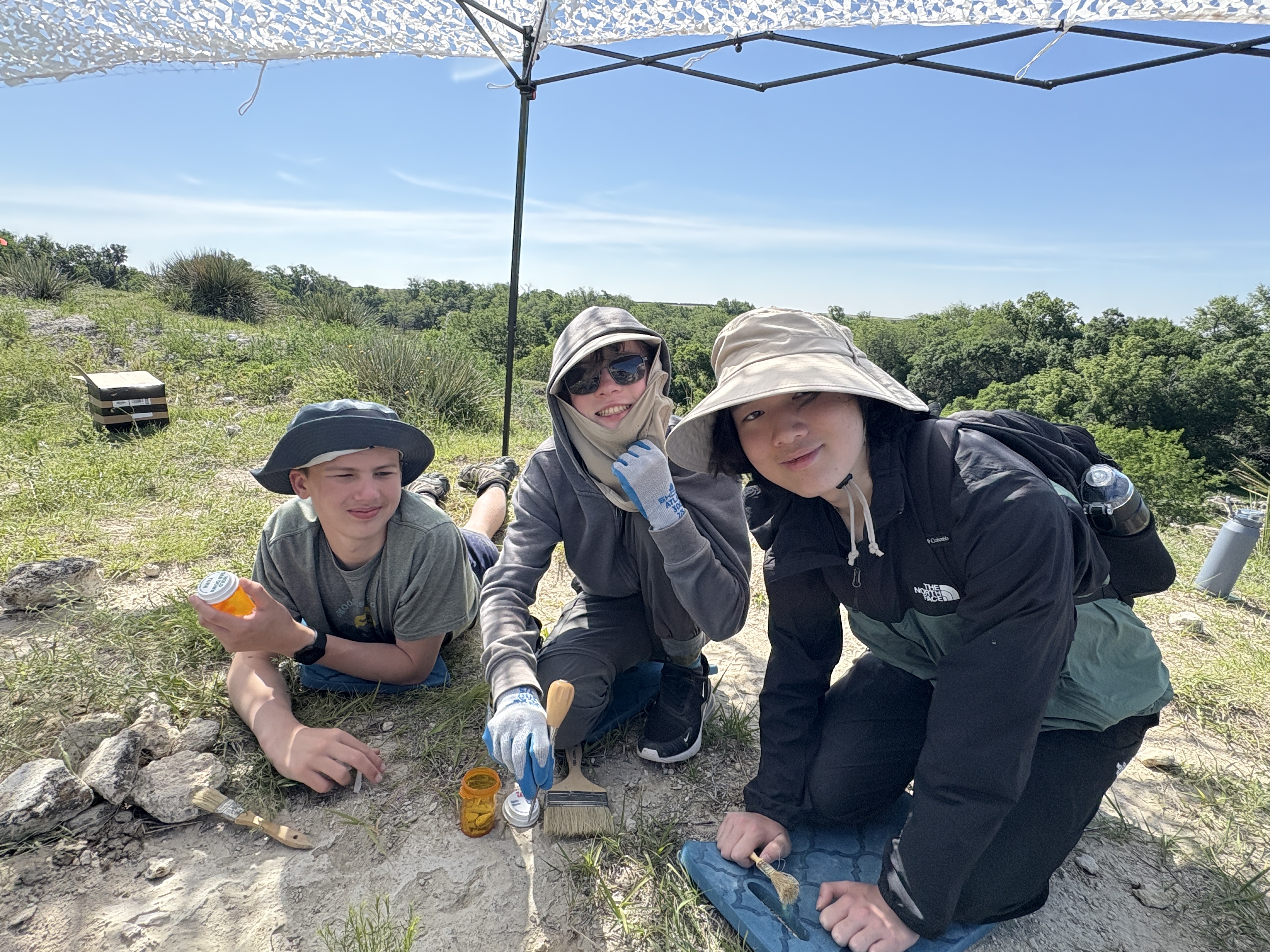 Students doing a mix of indoor and outdoor paleontology and geology.